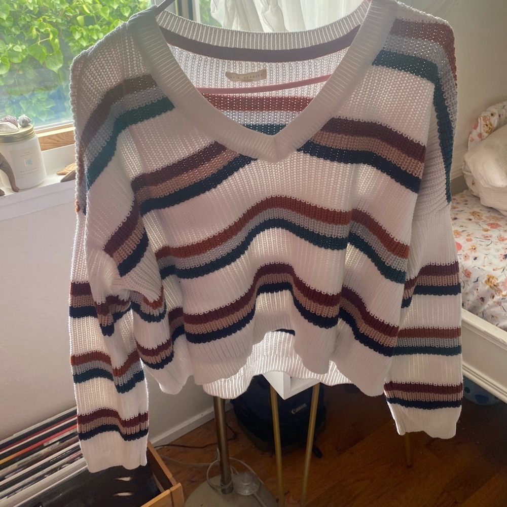 Knitted sweater striped and V-neck. Very comfortable, size small, bit oversized.